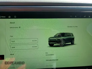 2023 Rivian R1S Launch Edition z VIN 7PDSGABL9PN022280, wystawiony jako Copart lot #83526124 z przebiegiem 51 mil mil oraz Szkoda całkowita • Salvage title. Historia ofert i sprzedaży dostępna na DreamBid. Obrazek 9.
