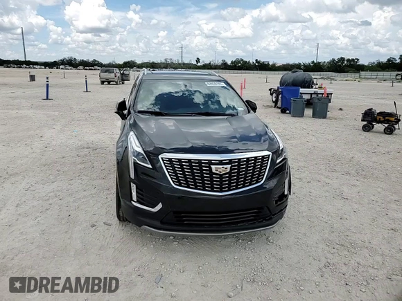 2021 Cadillac XT5 FWD Premium Luxury with VIN 1GYKNCRS0MZ100515, listed as a Copart auction lot 62856785 with 50,298 mi miles and Salvage title. Bid and sale history available at DreamBid. Image 14.