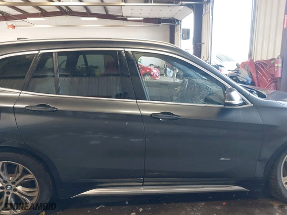 2016 BMW X1 xDrive28i with VIN WBXHT3C3XGP885359, listed as a IAAI auction lot 41743616 with 44,436 mi miles. Bid and sale history available at carsss.com. Image 13.