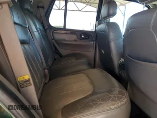 2004 GMC Envoy SLT z VIN 1GKDS13S942127830, wystawiony jako Copart lot #87165024 z przebiegiem 172 592 mil mil oraz Szkoda całkowita • Salvage title. Historia ofert i sprzedaży dostępna na DreamBid. Obrazek 11.