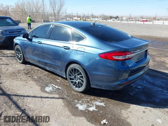 2018 Ford Fusion S with VIN 3FA6P0G77JR129224, listed as a IAAI auction lot 41483648 with 104,045 mi miles. Bid and sale history available at carsss.com. Image 3.