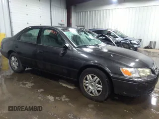 2001 Toyota Camry CE with VIN 4T1BG22K21U781964, listed as a IAAI auction lot 35629457 with 171,488 mi miles. Bid and sale history available at carsss.com. Image 6.