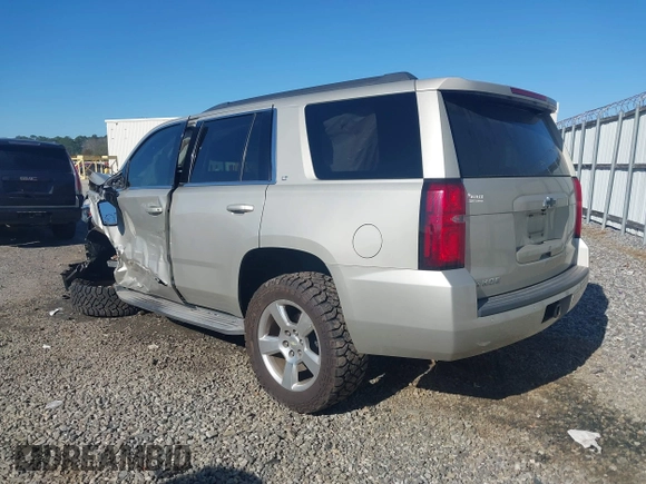 2015 Chevrolet Tahoe LT with VIN 1GNSCBKC8FR646756, listed as a IAAI auction lot 41856070 with 138,495 mi miles and . Bid and sale history available at DreamBid. Image 3.