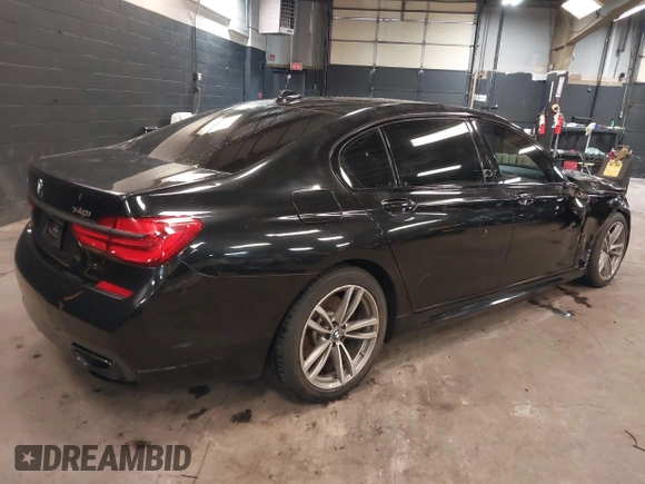 2018 BMW 7 Series 740i xDrive z VIN WBA7E4C51JGV24133, wystawiony jako IAAI lot #42253139 z przebiegiem 77 370 mil mil oraz . Historia ofert i sprzedaży dostępna na DreamBid. Obrazek 4.
