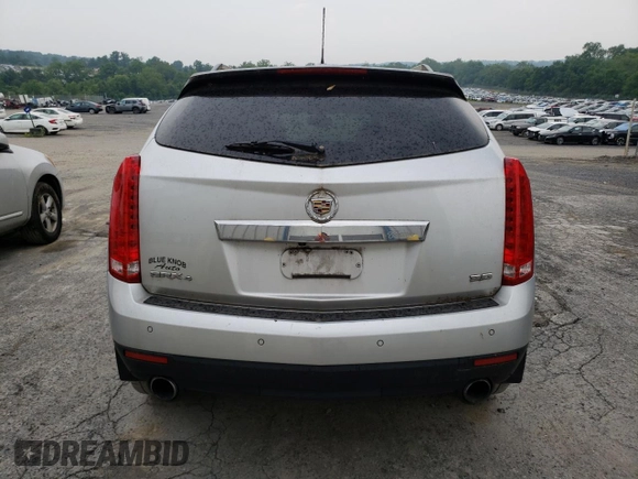 2015 Cadillac SRX Performance Collection with VIN 3GYFNFE36FS549358, listed as a Copart auction lot 59724065 with 132,045 mi miles and Salvage title. Bid and sale history available at DreamBid. Image 6.