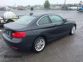 2016 BMW 2 Series 228i xDrive with VIN WBA1G9C50GV726365, listed as a IAAI auction lot 42358820 with 97,530 mi miles and . Bid and sale history available at DreamBid. Image 4.