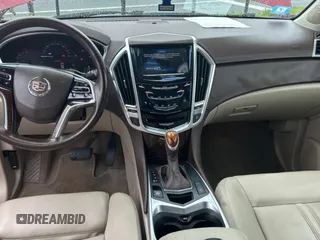2015 Cadillac SRX Luxury Collection z VIN 3GYFNBE37FS569840, wystawiony jako Copart lot #56965835 z przebiegiem 183 817 mil mil oraz Tytuł czysty. Historia ofert i sprzedaży dostępna na DreamBid. Obrazek 9.
