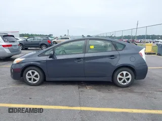 2013 Toyota Prius One z VIN JTDKN3DU8D5628034, wystawiony jako IAAI lot #42383865 z przebiegiem 218 167 mil mil oraz . Historia ofert i sprzedaży dostępna na DreamBid. Obrazek 14.