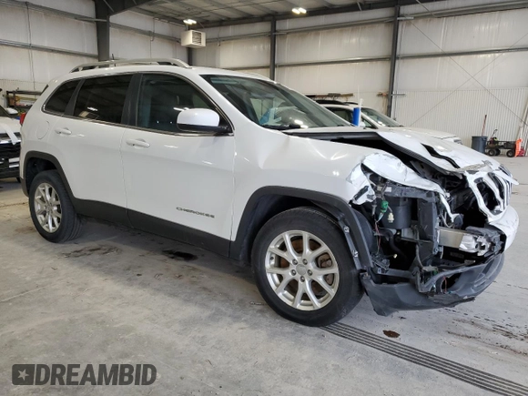 2016 Jeep Cherokee Latitude with VIN 1C4PJLCB6GW201337, listed as a Copart auction lot 50885755 with 185,135 mi miles and Salvage Title. Bid and sale history available at carsss.com. Image 4.