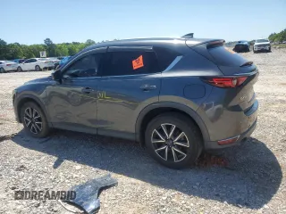 2018 Mazda CX-5 Grand Touring with VIN JM3KFADM9J0343621, listed as a Copart auction lot 52284475 with 129,776 mi miles and Salvage Title. Bid and sale history available at DreamBid. Image 2.