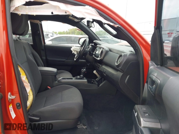 2018 Toyota Tacoma SR5 z VIN 3TMAZ5CN2JM076140, wystawiony jako IAAI lot #41913486 z przebiegiem 142 212 mil mil oraz . Historia ofert i sprzedaży dostępna na DreamBid. Obrazek 5.
