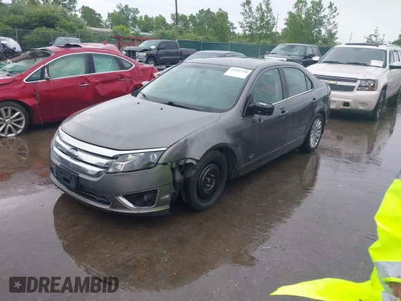 2010 Ford Fusion Hybrid with VIN 3FADP0L37AR242651, listed as a IAAI auction lot 42457758 with 196,894 mi miles and . Bid and sale history available at DreamBid. Image 2.