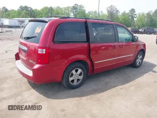 2010 Dodge Grand Caravan SXT with VIN 2D4RN5D17AR145958, listed as a IAAI auction lot 42125450 with 229,790 mi miles and . Bid and sale history available at DreamBid. Image 4.
