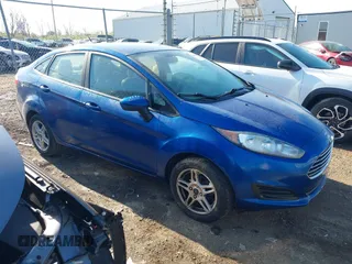 2019 Ford Fiesta SE z VIN 3FADP4BJXKM162542, wystawiony jako IAAI lot #42048282 z przebiegiem 68 789 mil mil oraz . Historia ofert i sprzedaży dostępna na DreamBid. Obrazek 1.