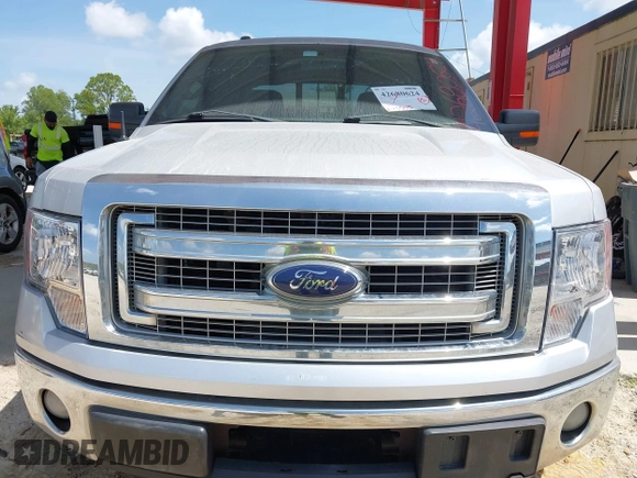 2013 Ford F-150 XL z VIN 1FTFW1CTXDKG41882, wystawiony jako IAAI lot #42680624 z przebiegiem 243 505 mil mil oraz . Historia ofert i sprzedaży dostępna na DreamBid. Obrazek 6.