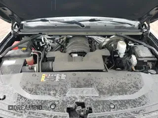 2018 Chevrolet Tahoe LT z VIN 1GNSKBKC6JR326556, wystawiony jako Copart lot #84016885 z przebiegiem 91 538 mil mil oraz Szkoda całkowita • Salvage title. Historia ofert i sprzedaży dostępna na DreamBid. Obrazek 14.