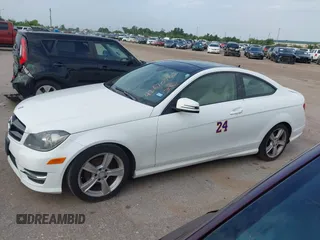 2015 Mercedes-Benz C 250 with VIN WDDGJ4HB9FG370183, listed as a IAAI auction lot 42670705 with 127,582 mi miles and . Bid and sale history available at DreamBid. Image 14.