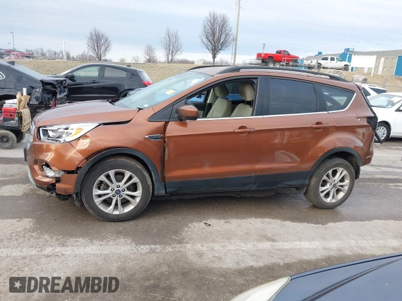 2017 Ford Escape SE with VIN 1FMCU0GD5HUE08097, listed as a IAAI auction lot 41499800 with 70,911 mi miles. Bid and sale history available at carsss.com. Image 14.