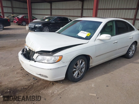 2007 Hyundai Azera SE with VIN KMHFC46F07A139369, listed as a IAAI auction lot 41999327 with 145,827 mi miles and . Bid and sale history available at DreamBid. Image 2.