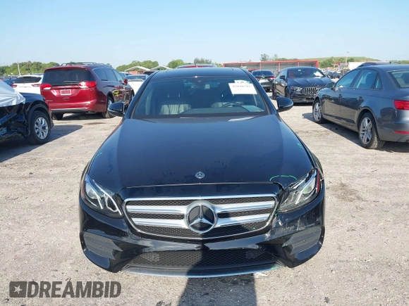 2018 Mercedes-Benz E 300 with VIN WDDZF4JB5JA380872, listed as a IAAI auction lot 42048785 with 94,574 mi miles and . Bid and sale history available at DreamBid. Image 12.