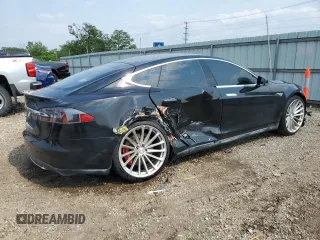 2014 Tesla Model S 60 with VIN 5YJSA1H11EFP36611, listed as a Copart auction lot 59544085 with 97,214 mi miles and Salvage title. Bid and sale history available at DreamBid. Image 3.
