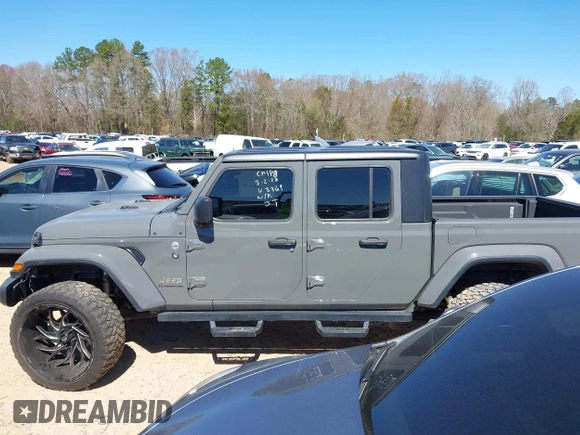 2020 Jeep Gladiator Overland z VIN 1C6HJTFG4LL143369, wystawiony jako IAAI lot #41827409 z przebiegiem 77 752 mil mil oraz . Historia ofert i sprzedaży dostępna na DreamBid. Obrazek 14.