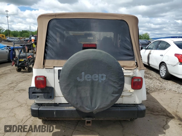1999 Jeep Wrangler Sahara с VIN 1J4FY49S3XP482537, выставлен на аукционе Copart как лот 56517845 с пробегом 219 684 миль миль и Чистый • Clean title. История ставок и продаж доступна на DreamBid. Изображение 6.