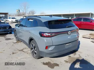 2024 Volkswagen ID.4 Standard z VIN 1V2BMPE86RC004522, wystawiony jako IAAI lot #41596962 z przebiegiem 7820 mil mil oraz . Historia ofert i sprzedaży dostępna na DreamBid. Obrazek 3.