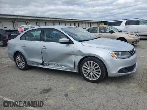 2012 Volkswagen Jetta SEL with VIN 3VWLX7AJXCM361484, listed as a Copart auction lot 53260985 with 155,585 mi miles and Salvage title. Bid and sale history available at DreamBid. Image 4.