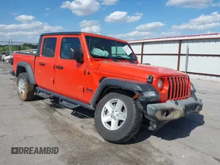2020 Jeep Gladiator Sport S with VIN 1C6HJTAG1LL154854, listed as a IAAI auction lot 42272169 with 66,909 mi miles and . Bid and sale history available at DreamBid. Image 1.
