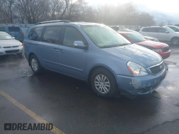 2014 Kia Sedona LX with VIN KNDMG4C79E6547589, listed as a IAAI auction lot 41724633 with 211,213 mi miles. Bid and sale history available at carsss.com. Image 1.