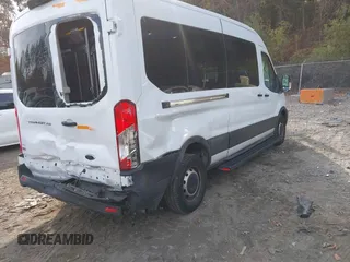 2023 Ford Transit Cargo with VIN 1FTBR1C86PKA52494, listed as a IAAI auction lot 40740671 with 9,999 mi miles and . Bid and sale history available at DreamBid. Image 4.