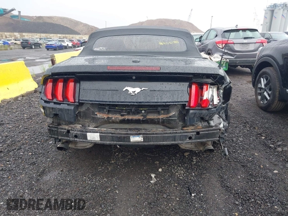 2020 Ford Mustang EcoBoost z VIN 1FATP8UH7L5131625, wystawiony jako IAAI lot #42295906 z przebiegiem 74 572 mil mil oraz . Historia ofert i sprzedaży dostępna na DreamBid. Obrazek 16.