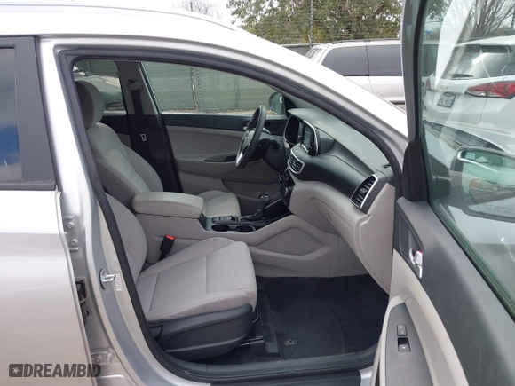 2019 Hyundai Tucson Value with VIN KM8J33A48KU927012, listed as a IAAI auction lot 41515397 with 62,501 mi miles. Bid and sale history available at carsss.com. Image 5.