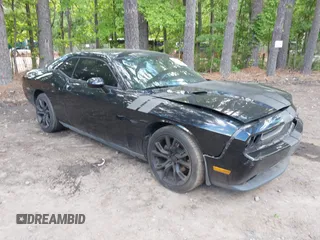 2013 Dodge Challenger SXT z VIN 2C3CDYAG2DH632743, wystawiony jako IAAI lot #42201981 z przebiegiem 154 018 mil mil oraz . Historia ofert i sprzedaży dostępna na DreamBid. Obrazek 1.