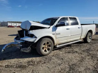 2013 Ram 1500 Laramie с VIN 1C6RR7VT0DS715418, выставлен на аукционе Copart как лот 82240494 с пробегом 202 360 миль миль и Списание • Salvage title. История ставок и продаж доступна на DreamBid. Изображение 1.