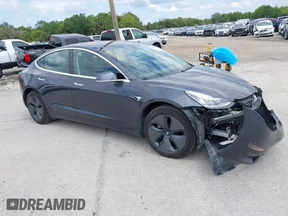 2018 Tesla Model 3 Long Range Battery with VIN 5YJ3E1EB3JF119498, listed as a IAAI auction lot 41966643 with 45,566 mi miles and . Bid and sale history available at DreamBid. Image 1.