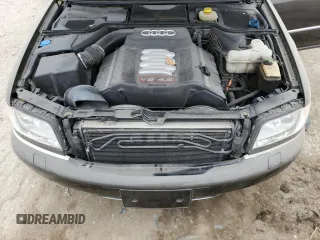 2001 Audi S8 z VIN WAUGU54DX1N012557, wystawiony jako Copart lot #85378574 z przebiegiem 102 562 mil mil oraz Tytuł czysty. Historia ofert i sprzedaży dostępna na DreamBid. Obrazek 11.