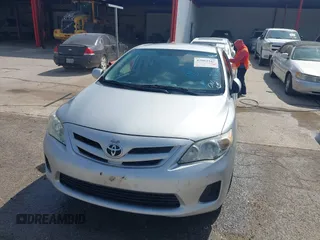2012 Toyota Corolla L with VIN 2T1BU4EE1CC773885, listed as a IAAI auction lot 42004443 with 192,607 mi miles. Bid and sale history available at carsss.com. Image 12.