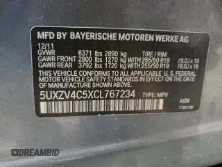 2012 BMW X5 35i z VIN 5UXZV4C5XCL767234, wystawiony jako Copart lot #64117285 z przebiegiem 187 969 mil mil oraz Czysty tytuł • Clean title. Historia ofert i sprzedaży dostępna na DreamBid. Obrazek 13.