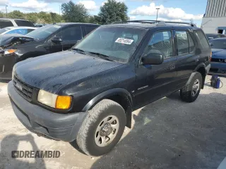 1999 Isuzu Rodeo S with VIN 4S2CK58W7X4357230, listed as a Copart auction lot 85214894 with 130,370 mi miles and Salvage Title. Bid and sale history available at carsss.com. Image 1.