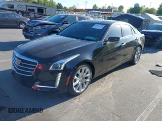 2015 Cadillac CTS Premium AWD with VIN 1G6AZ5S35F0129572, listed as a IAAI auction lot 42045670 with 62,758 mi miles and . Bid and sale history available at DreamBid. Image 17.