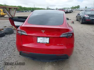 2021 Tesla Model Y Long Range z VIN 5YJYGDEE3MF173321, wystawiony jako IAAI lot #42163343 z przebiegiem 46 569 mil mil oraz . Historia ofert i sprzedaży dostępna na DreamBid. Obrazek 17.