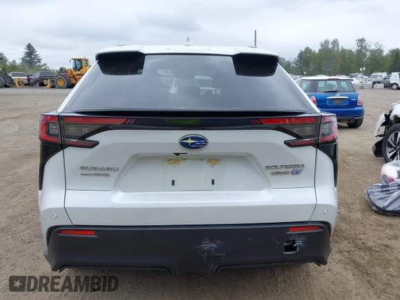 2023 Subaru Solterra Premium z VIN JTMABABA6PA031333, wystawiony jako IAAI lot #42267317 z przebiegiem 9 961 mil mil oraz . Historia ofert i sprzedaży dostępna na DreamBid. Obrazek 16.