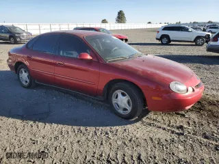 1997 Ford Taurus GL with VIN 1FALP52U6VA301952, listed as a Copart auction lot 74245204 with 152,562 mi miles and Salvage Title. Bid and sale history available at carsss.com. Image 4.