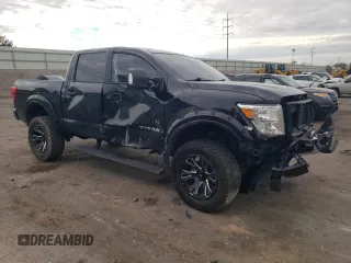 2022 Nissan Titan SV with VIN 1N6AA1ED2NN103267, listed as a Copart auction lot 68942064 with 55,119 mi miles and Salvage title. Bid and sale history available at DreamBid. Image 4.