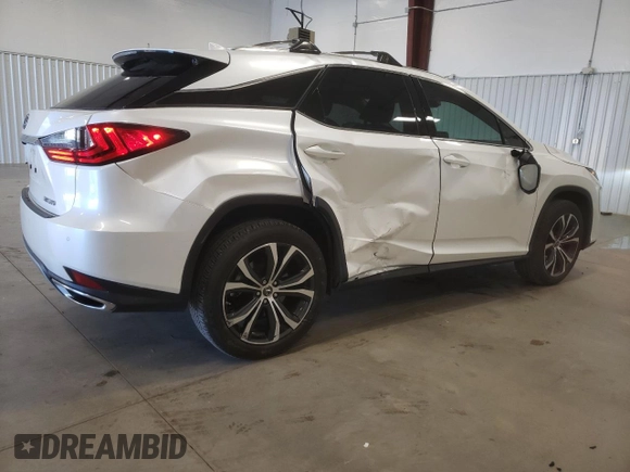 2022 Lexus RX with VIN 2T2HZMAA2NC220854, listed as a Copart auction lot 38512353 with 23,777 mi miles. Bid and sale history available at carsss.com. Image 3.