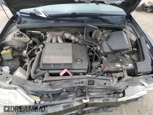 2000 Toyota Avalon XL with VIN 4T1BF28B4YU105732, listed as a Copart auction lot 54752665 with 143,855 mi miles and Salvage Title. Bid and sale history available at DreamBid. Image 11.