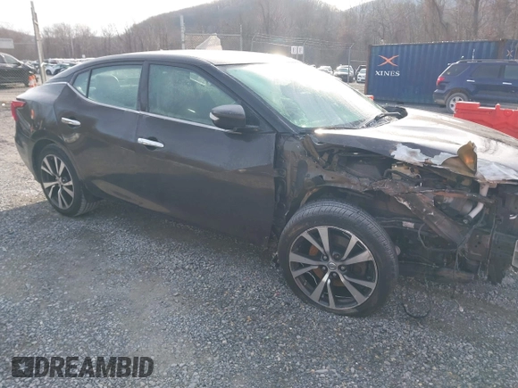 2016 Nissan Maxima SL z VIN 1N4AA6AP9GC385718, wystawiony jako IAAI lot #41099349 z przebiegiem 108 841 mil mil oraz . Historia ofert i sprzedaży dostępna na DreamBid. Obrazek 1.