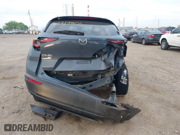 2023 Mazda CX-30 S Carbon Edition with VIN 3MVDMBCM4PM577619, listed as a IAAI auction lot 42219801 with 24,784 mi miles and . Bid and sale history available at DreamBid. Image 16.